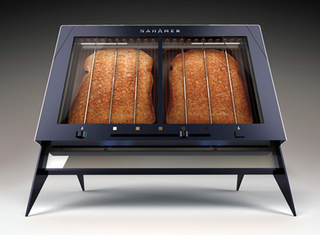 Illustration for article titled The Nahamer T450 Toaster Eliminates Toast Popping For Toast Dropping